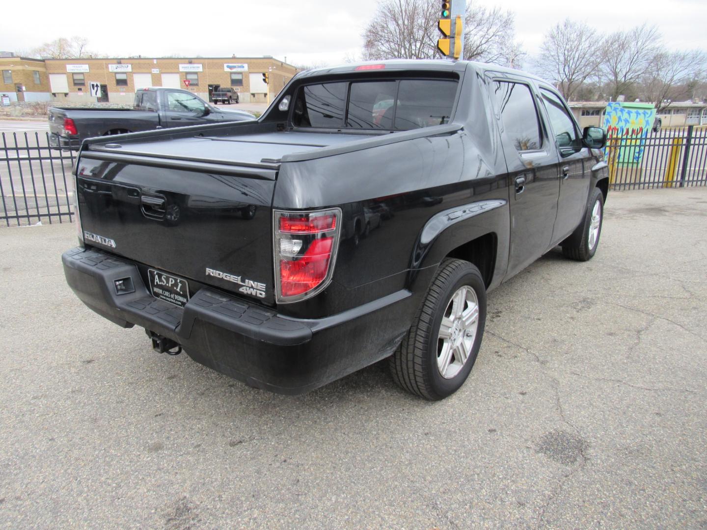 2012 BLACK /Gray Honda Ridgeline RTL (5FPYK1F56CB) , Automatic transmission, located at 215 Milton St, Dedham, MA, 02026, (781) 329-5144, 42.241905, -71.157295 - This nice Ridgeline is in excellent condition. Runs like new. All ASPI Motor Cars vehicles are fully serviced before they are delivered to assure the highest quality used vehicles. Comes with a 3/3 warranty included in the price. call for details. Prices on all vehicles do not include $299.95 Doc - Photo#4